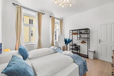 Ein Bett oder Betten in einem Zimmer der Unterkunft Traum-Wohnung, 63m², TOP Öffi-Anbindung, Smart-TV.