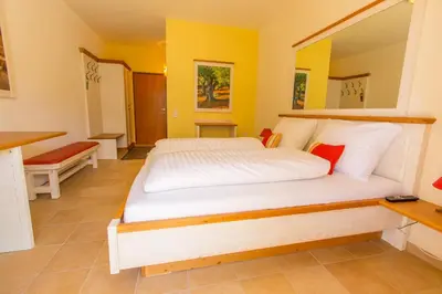 Ein Bett oder Betten in einem Zimmer der Unterkunft Hotel Elia