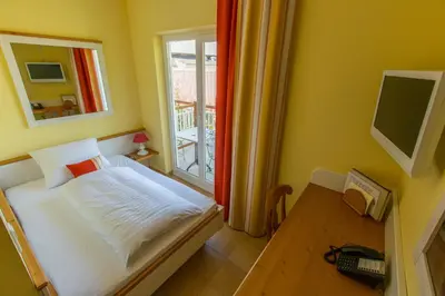 Ein Bett oder Betten in einem Zimmer der Unterkunft Hotel Elia