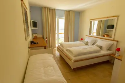 Ein Bett oder Betten in einem Zimmer der Unterkunft Hotel Elia