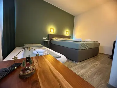 Ein Bett oder Betten in einem Zimmer der Unterkunft bookVienna 