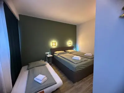 Ein Bett oder Betten in einem Zimmer der Unterkunft bookVienna 