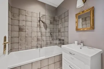 Ein Badezimmer in der Unterkunft Gemütliches und modernes Apartment, 38m²
