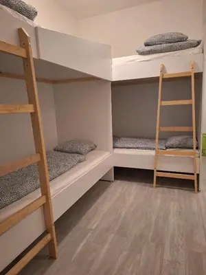 Ein Bett oder Betten in einem Zimmer der Unterkunft Augarten R19