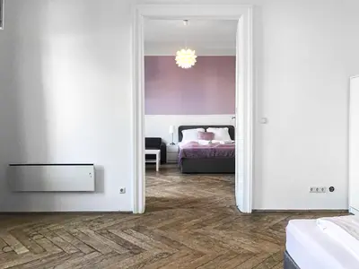 Ein Bett oder Betten in einem Zimmer der Unterkunft Vibrant 3BR near AKH Hospital - Perfect for Groups