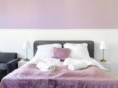 Ein Bett oder Betten in einem Zimmer der Unterkunft Vibrant 3BR near AKH Hospital - Perfect for Groups