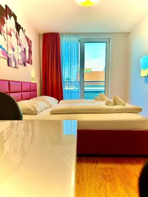 Ein Bett oder Betten in einem Zimmer der Unterkunft Apartments4you