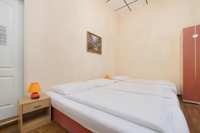 Ein Bett oder Betten in einem Zimmer der Unterkunft Pension Votiv