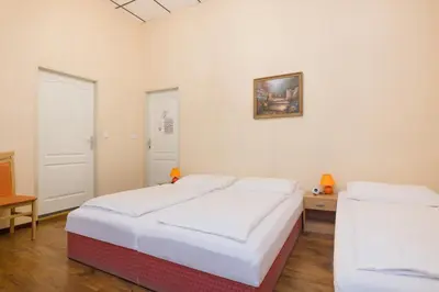 Ein Bett oder Betten in einem Zimmer der Unterkunft Pension Votiv