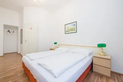 Ein Bett oder Betten in einem Zimmer der Unterkunft Pension Votiv