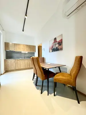 Ein Sitzbereich in der Unterkunft Möbliertes Apartment mit Terrasse