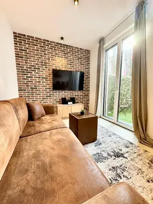 TV/Unterhaltungsangebot in der Unterkunft Möbliertes Apartment mit Terrasse