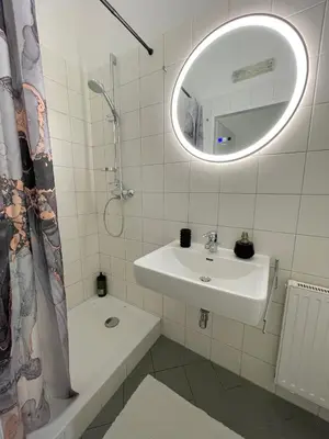 Ein Badezimmer in der Unterkunft Authentic apartment near the city centre