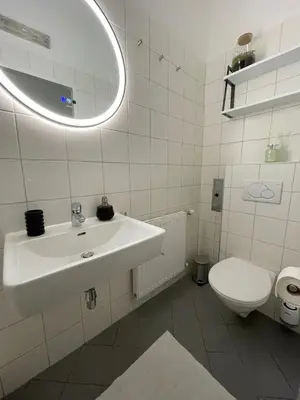 Ein Badezimmer in der Unterkunft Authentic apartment near the city centre