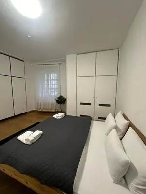 Ein Bett oder Betten in einem Zimmer der Unterkunft DATRI Petite Suite 1 - 3