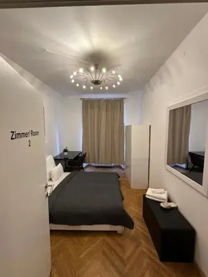Ein Bett oder Betten in einem Zimmer der Unterkunft DATRI Petite Suite 1 - 3