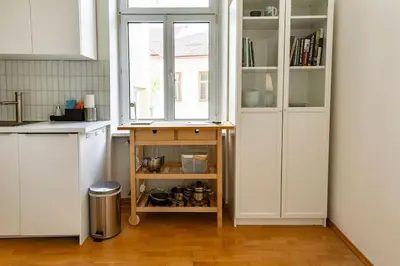 Küche/Küchenzeile in der Unterkunft Savoir-Vivre in unserer zentralen Balkonwohnung