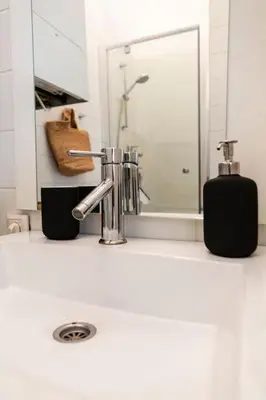 Ein Badezimmer in der Unterkunft Savoir-Vivre in unserer zentralen Balkonwohnung