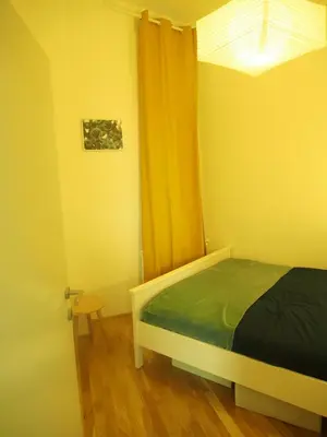 Ein Bett oder Betten in einem Zimmer der Unterkunft Nähe Naschmarkt