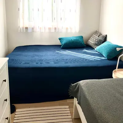 Ein Bett oder Betten in einem Zimmer der Unterkunft Ferienhaus Seeblick