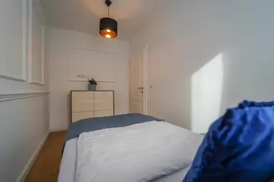 Ein Bett oder Betten in einem Zimmer der Unterkunft BelVie Residence