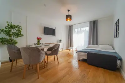 Ein Bett oder Betten in einem Zimmer der Unterkunft BelVie Residence