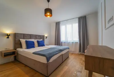Ein Bett oder Betten in einem Zimmer der Unterkunft BelVie Residence