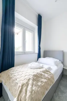 Ein Bett oder Betten in einem Zimmer der Unterkunft Quiet apartment near Vienna - 60m2 - 24h check-in - for business and family