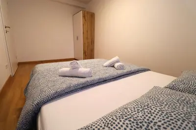 Ein Bett oder Betten in einem Zimmer der Unterkunft Luxuriöses Duplex Apartment 130m2