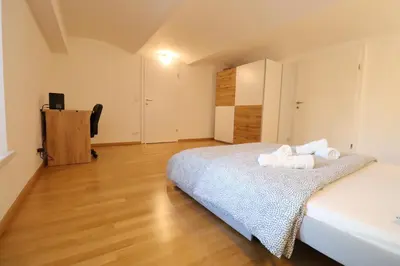 Ein Bett oder Betten in einem Zimmer der Unterkunft Luxuriöses Duplex Apartment 130m2