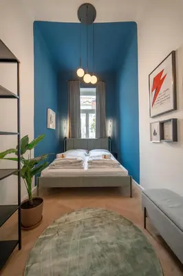 Ein Bett oder Betten in einem Zimmer der Unterkunft josef's home I Moderne Deluxe Suite am Augarten