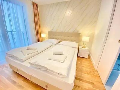 Ein Bett oder Betten in einem Zimmer der Unterkunft Steiner Residences Vienna Rembrandt