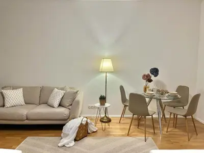 Ein Sitzbereich in der Unterkunft Zentrales Apartment mit Balkon