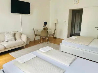 Ein Bett oder Betten in einem Zimmer der Unterkunft Zentrales Apartment mit Balkon