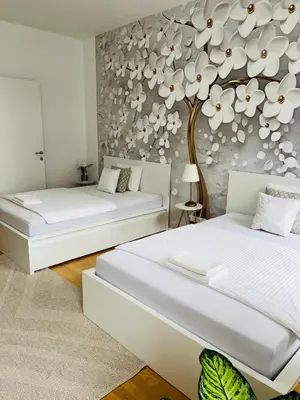 Ein Bett oder Betten in einem Zimmer der Unterkunft Zentrales Apartment mit Balkon
