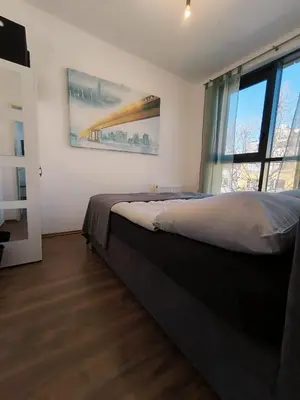 Ein Bett oder Betten in einem Zimmer der Unterkunft pretty apartment next to metro station