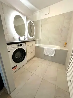Ein Badezimmer in der Unterkunft COHO City Apartments mit hauseigener Tiefgarage