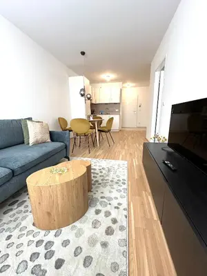 TV/Unterhaltungsangebot in der Unterkunft COHO City Apartments mit hauseigener Tiefgarage