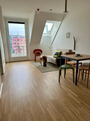 Ein Sitzbereich in der Unterkunft COHO City Apartments