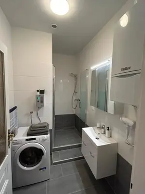 Ein Badezimmer in der Unterkunft Paky Appartements 00207