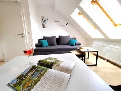 Ein Sitzbereich in der Unterkunft Ferienzimmer Reinisch in Tattendorf