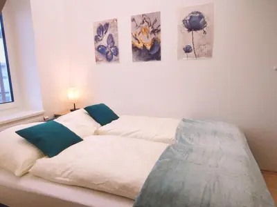 Ein Bett oder Betten in einem Zimmer der Unterkunft Ferienzimmer Reinisch in Tattendorf