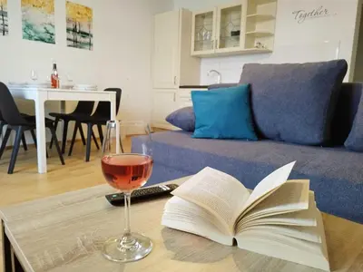 Ein Sitzbereich in der Unterkunft Ferienzimmer Reinisch in Tattendorf