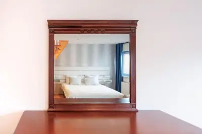 Ein Bett oder Betten in einem Zimmer der Unterkunft Scenic Rooftop flat with Terrace