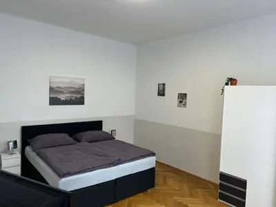Ein Bett oder Betten in einem Zimmer der Unterkunft Paky Appartements 00411