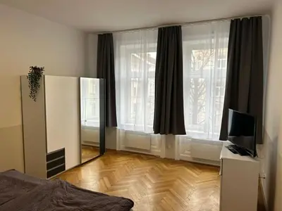 Ein Bett oder Betten in einem Zimmer der Unterkunft Paky Appartements 00411