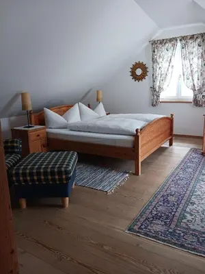 Ein Bett oder Betten in einem Zimmer der Unterkunft Gästehaus Hans Moser