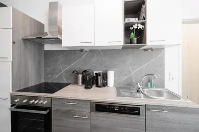 Küche/Küchenzeile in der Unterkunft Ruhige Apartments nähe U2 Messe Prater