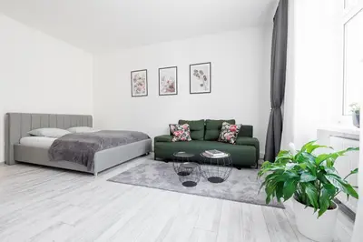 Ein Bett oder Betten in einem Zimmer der Unterkunft Ruhige Apartments nähe U2 Messe Prater