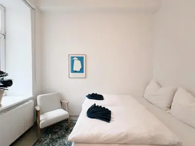 Ein Bett oder Betten in einem Zimmer der Unterkunft Central Loft Apartment near Belvedere Castle